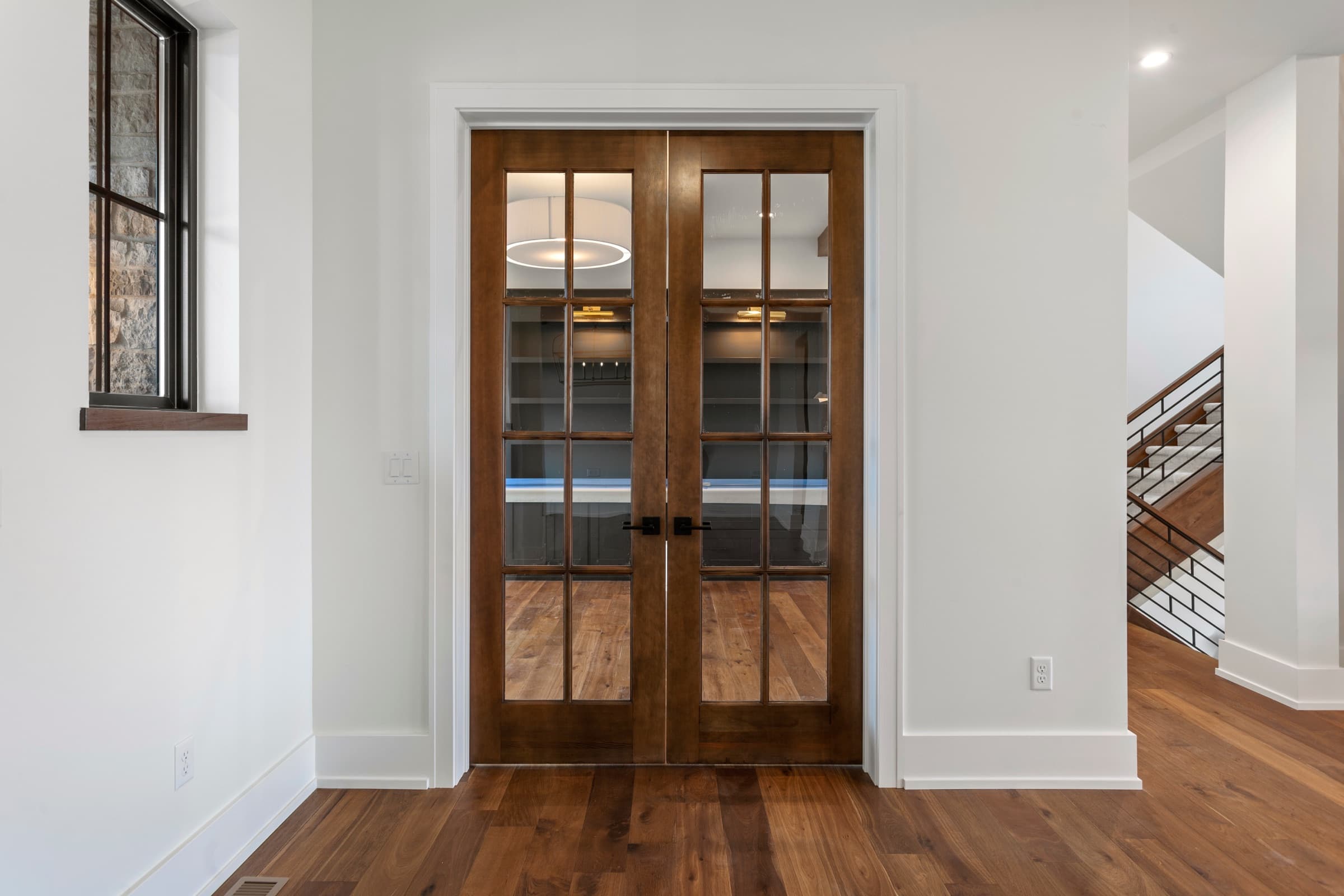 Walnut French doors with glass lites